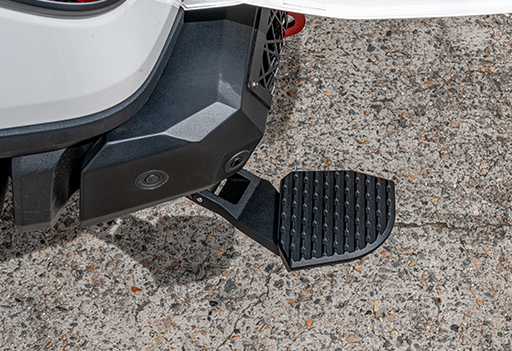 Next GEN Ranger Rear Step 2 Supreme Electric Rear Step deployed, offering superior, lower access next to the factory bumper step on a Ford Ranger.