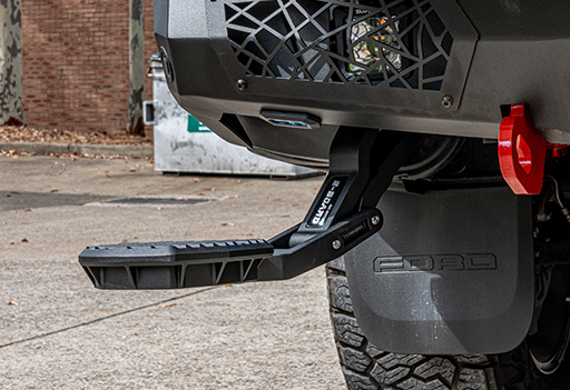 Next GEN Ranger Rear Step 3 Low angle view of the Supreme Electric Rear Step deployed, showcasing low stepping height and heavy-duty stability