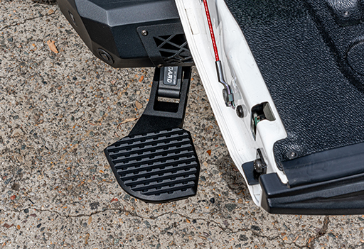 Next GEN Ranger Rear Step 6 Close-up on the wide, anti-slip surface of the deployed Supreme Electric Step for safe truck bed access