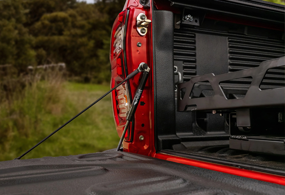 hsp tailgate assist A 4x4 tailgate assist is an aftermarket accessory kit, typically featuring gas struts and mounting hardware, designed to control the opening speed and reduce the lifting weight of a ute 4x4 heavy tailgate